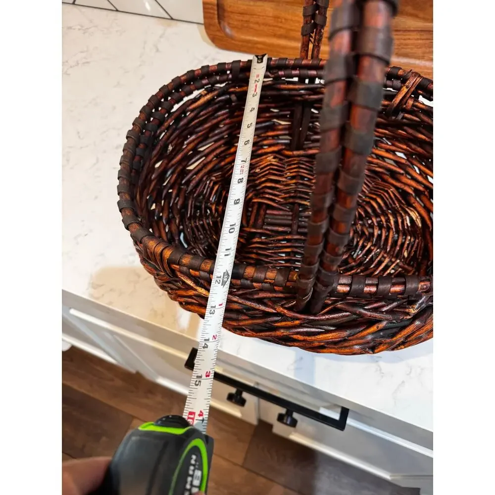 dark stained willow basket rustic handwoven texture sturdy center handle vintage